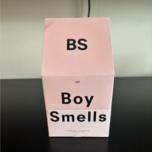Boy Smells Pink Candle With Box